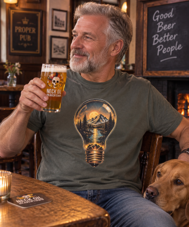 UAL Mountain Lightbulb T-Shirt – Charcoal Man wearing charcoal Unsupervised Apparel T-shirt with mountain sunset lightbulb graphic.