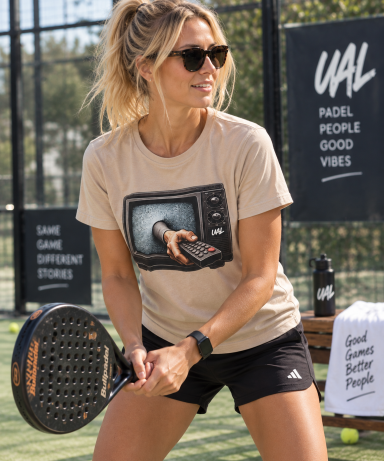 UAL Padel Lifestyle T-Shirt Woman wearing a UAL graphic T-shirt while playing padel