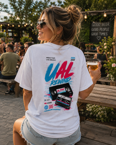 UAL Rewind T-Shirt – White Woman wearing white UAL Rewind graphic T-shirt